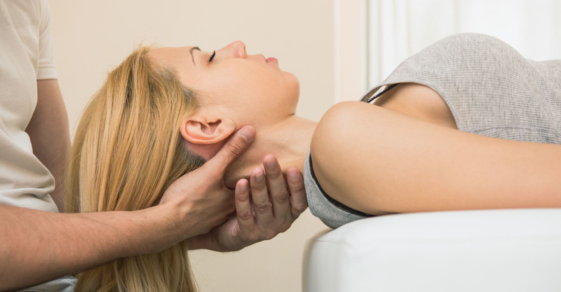 lady getting her neck adjusted